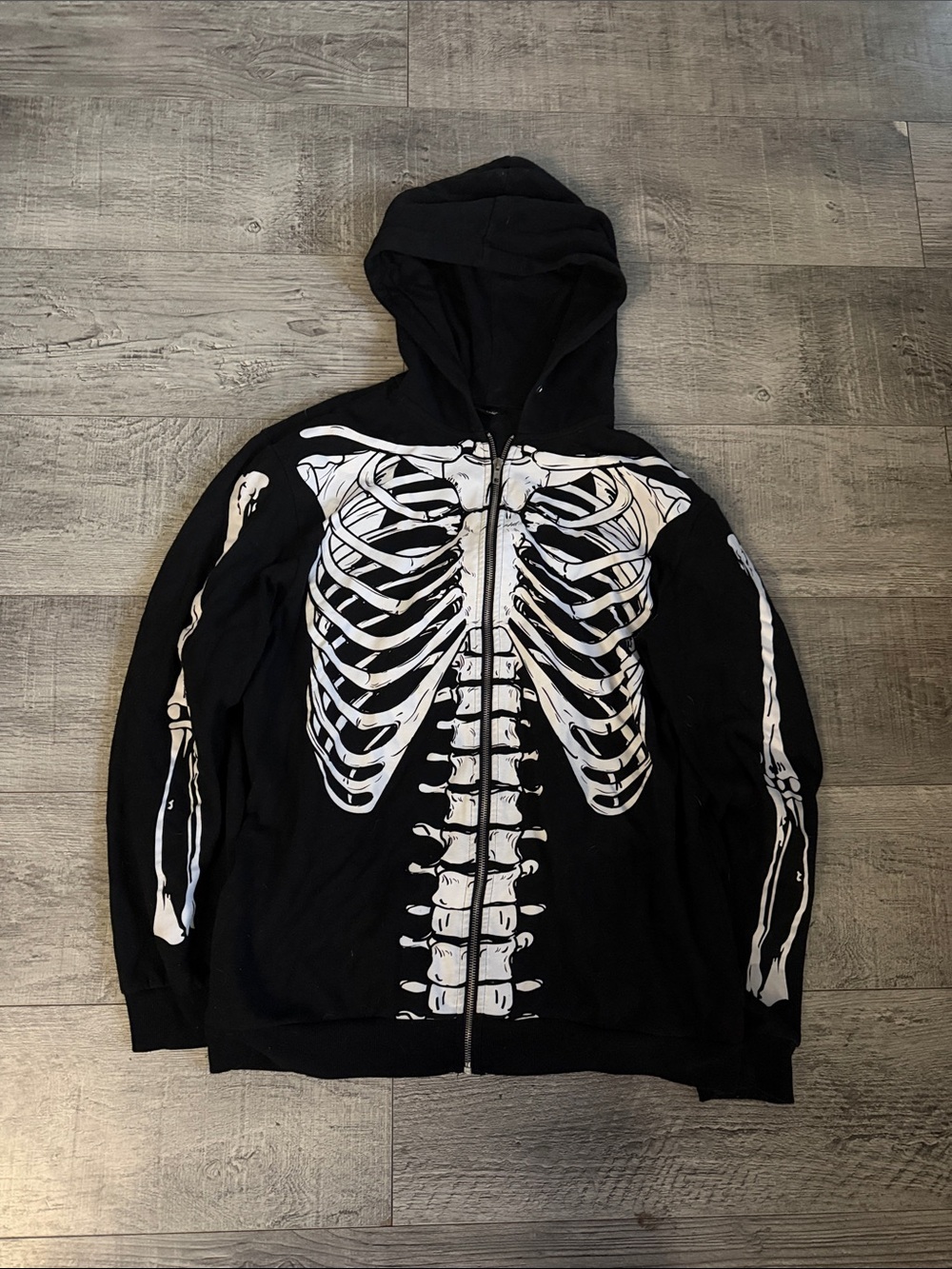 Spencer's Black Zip-Up Hoodie with White Skeleton Print